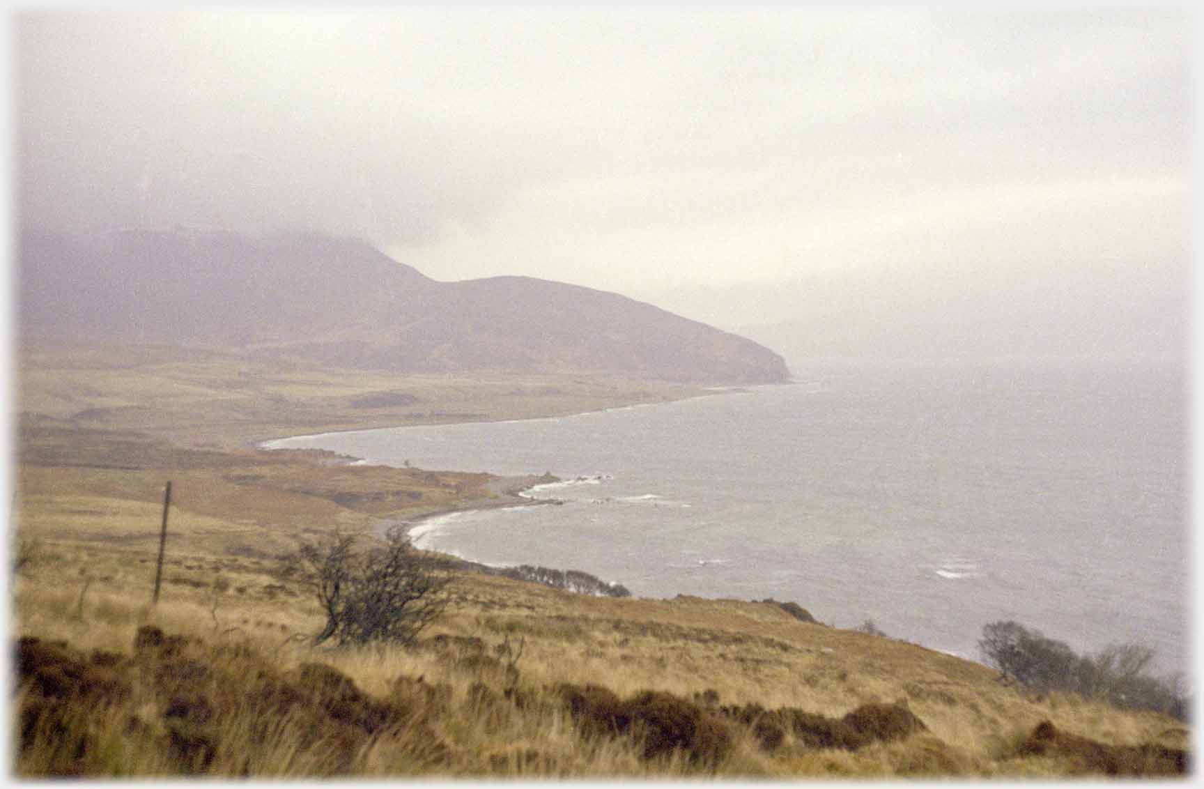 Bay with low cloud.