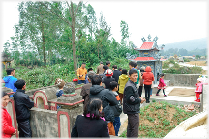 Family queuing to pay their respects at the tomb.