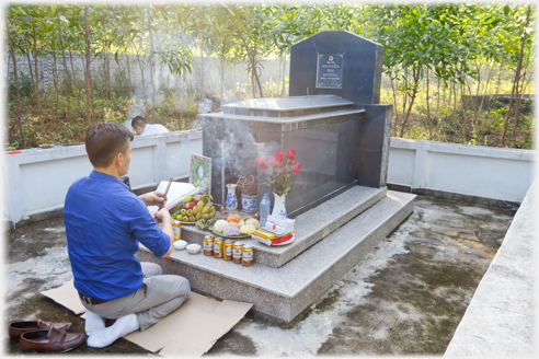 Incense being burnt at the tomb.