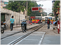 Railway line with motorbike parked on it.