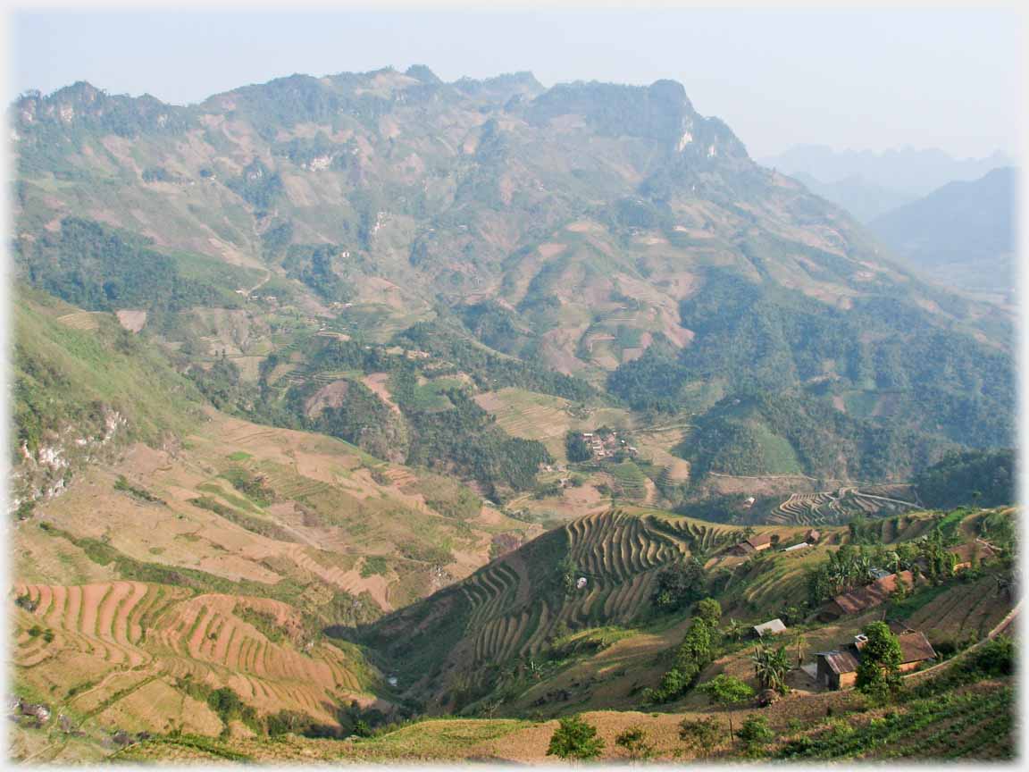Very rough large hill, houses in foreground.