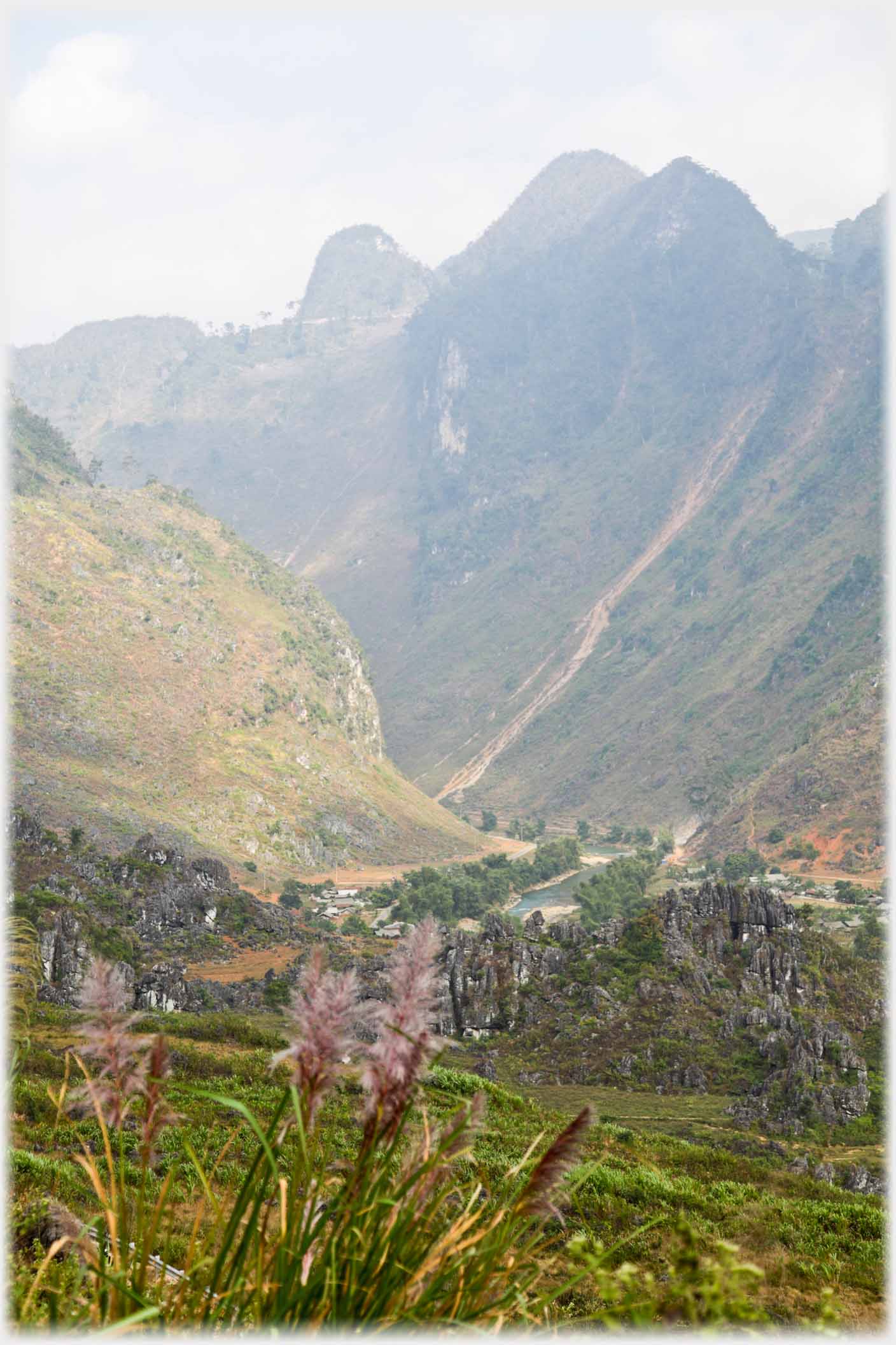 High steep valley side capped with karsts.