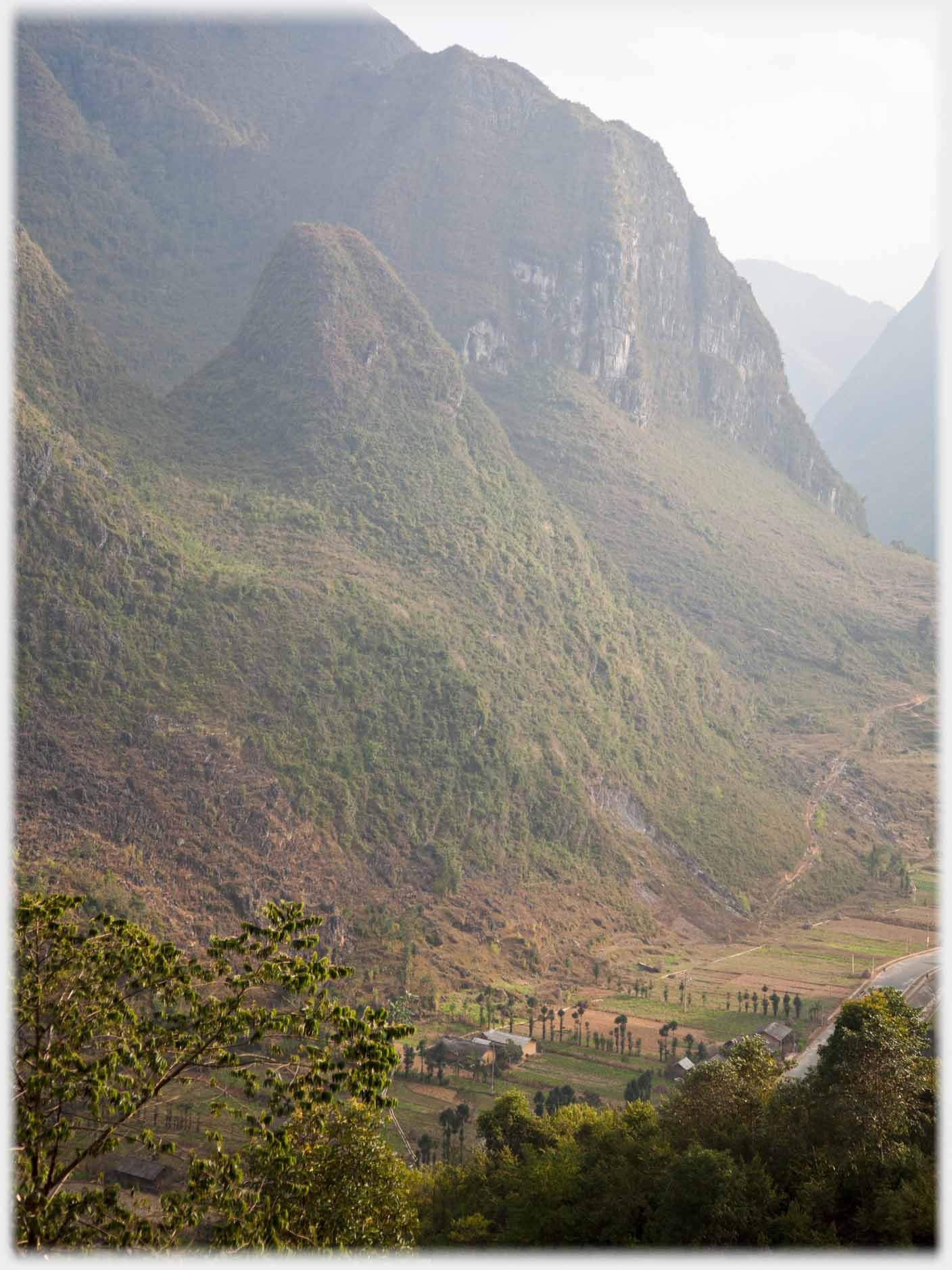 Same protruding karst but showing the domesticated valley below.