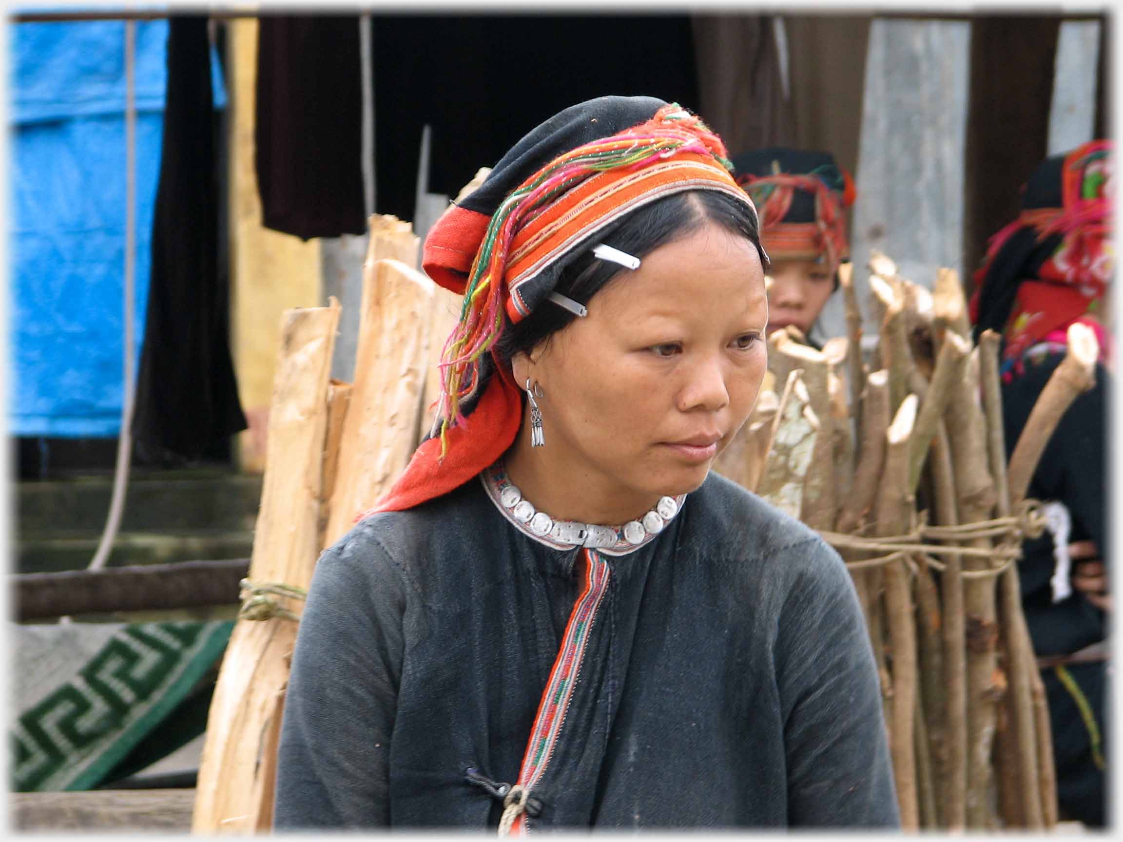 Portrait of woman looking down.