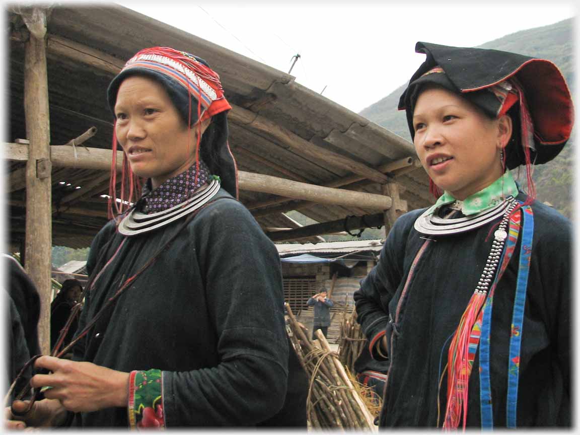 Two women looking left.