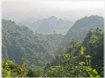 Receeding jungle covered hillsides.