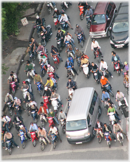 Looking down on the motorbikes waiting for traffic lights - well spaced out.