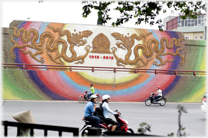 Mural by road of two dragons ưith the years 1010- 2010.
