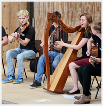 The Feis rois Ceilidh group, violins, guitar and harp.