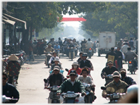 Motorcycle traffic on a Ha Noi street.