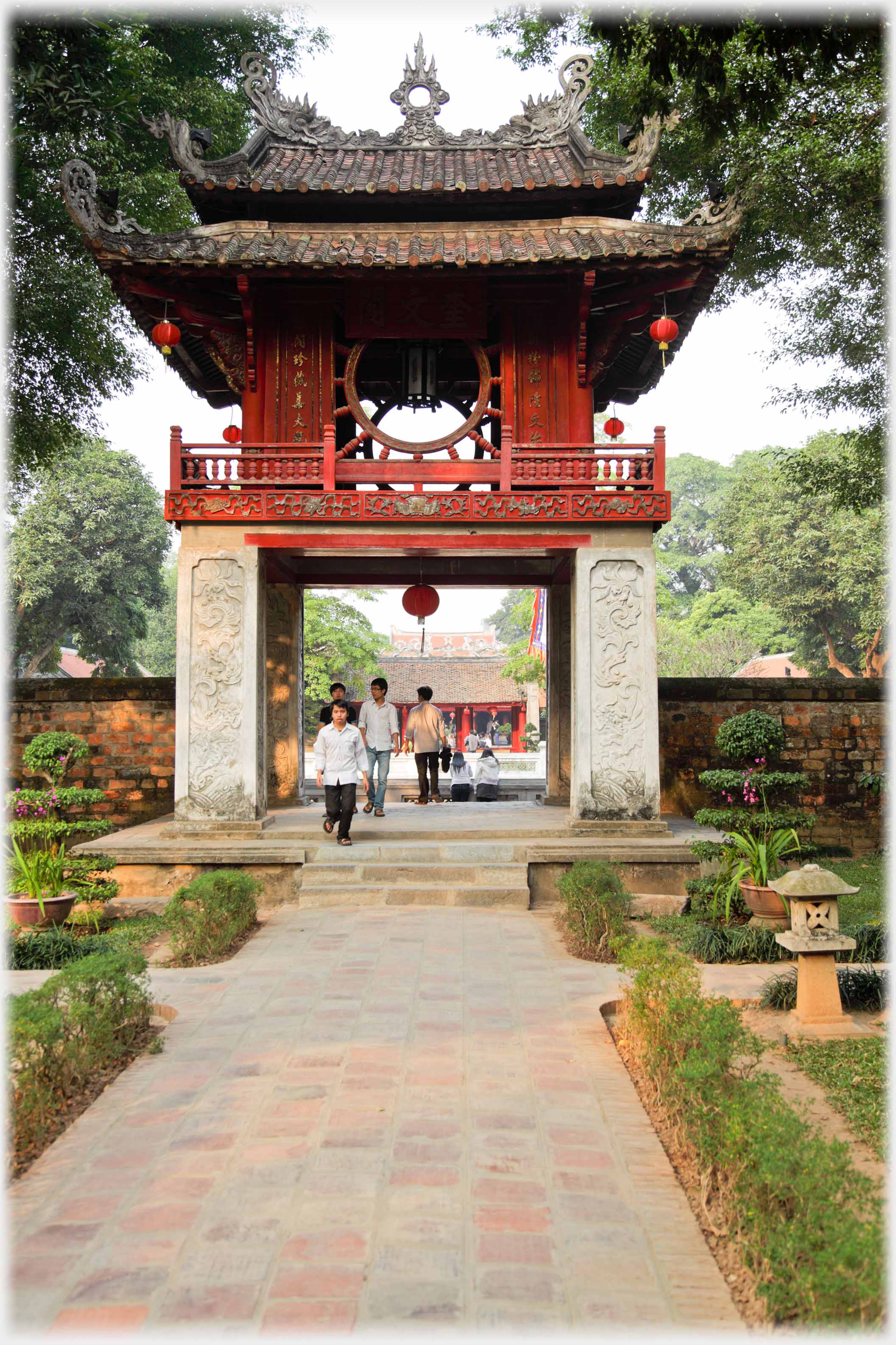 Double roofed room with balcony on four pillars.