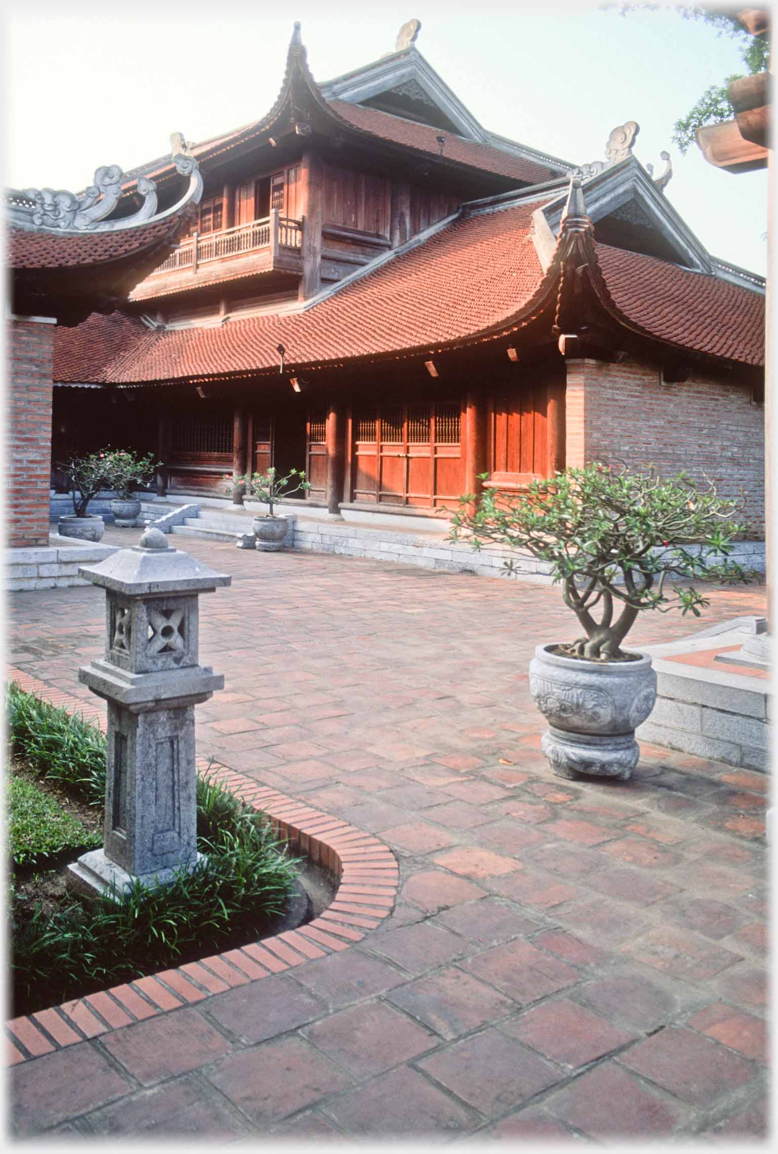 The two story building at the back of the Temple.