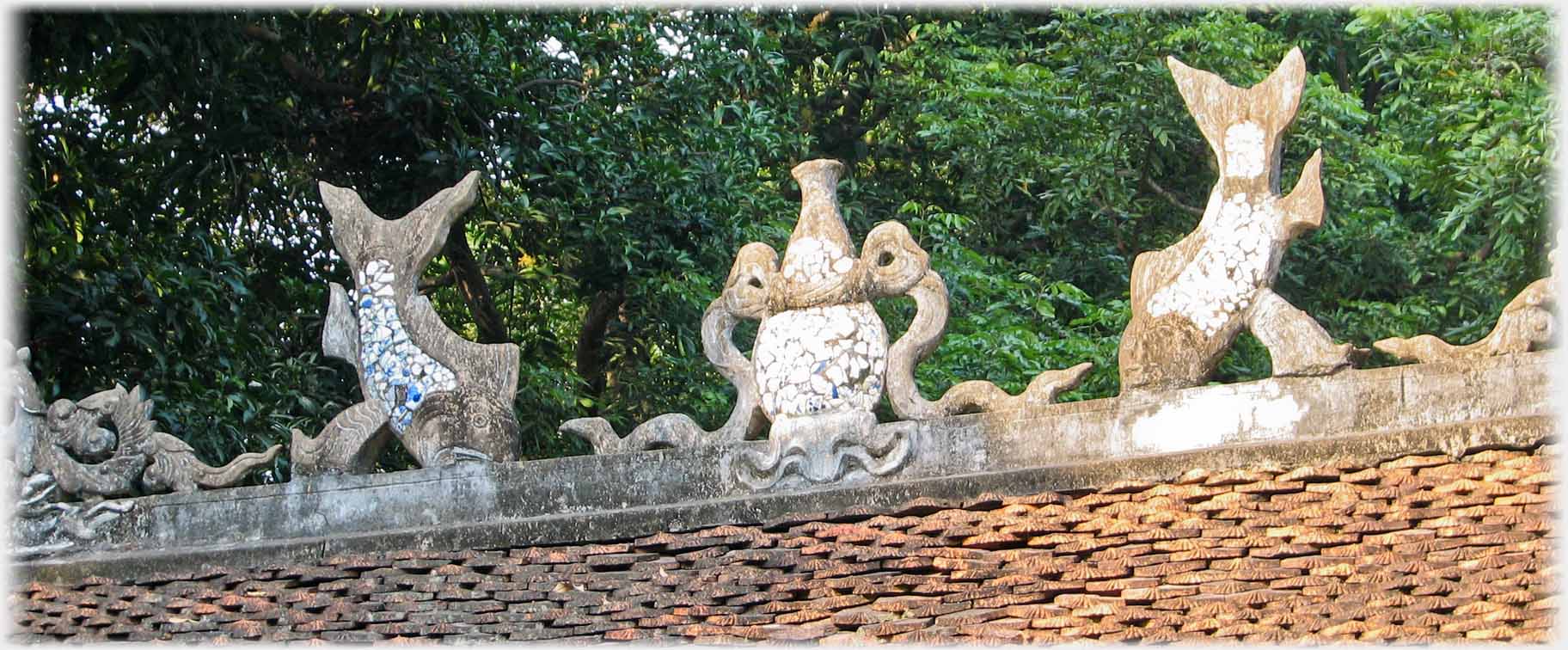 Close up of roof carvings from previous building.