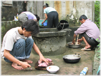 Family preparing meal in kitchen.