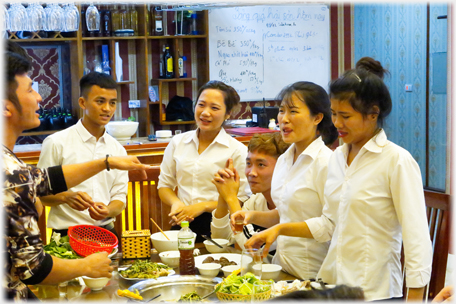 Group of staff toasting.