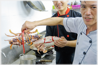 Two large crabs about to be boiled.