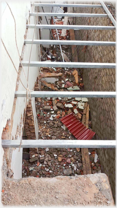 The floor being put into the corridor.