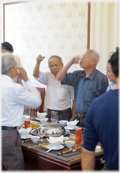 Men toasting.