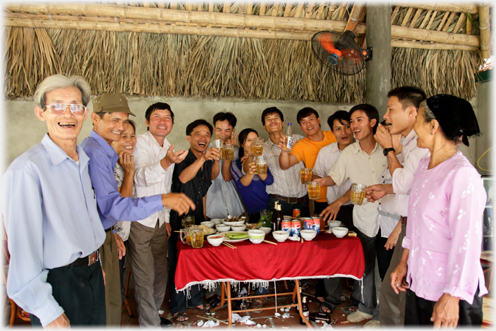 Extended family group well into celebrating the new cafe and house.