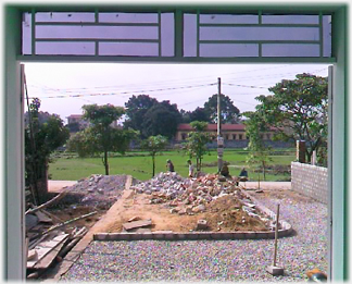 View from the front door to fields beyond the road.