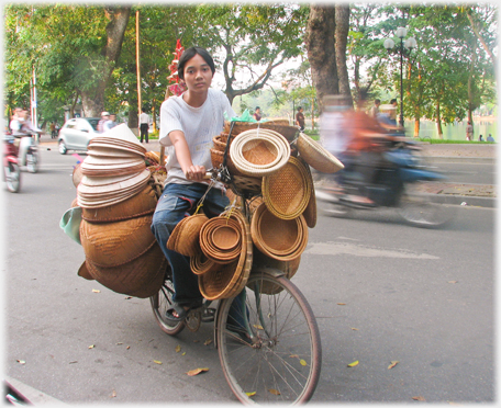 Youth selling baskets.