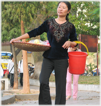 Woman selling fruit.