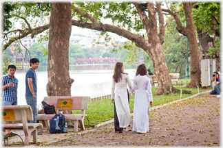 Team taking photos of Long Dresses