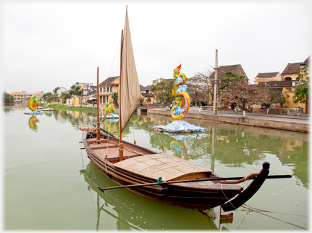 A sailing boat with cargo.