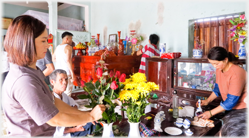 Women preparing items.