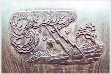 Detail of bronze urn with lightening.