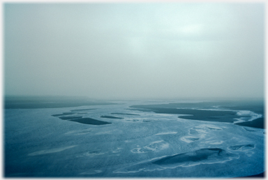 River disappearing into dust cloud