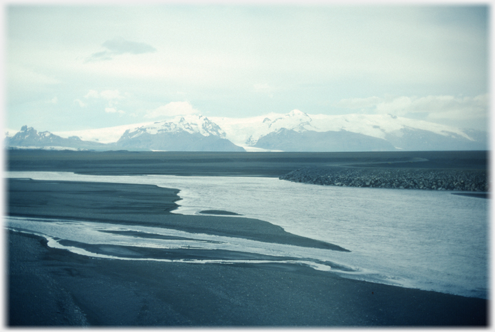 River with mountains beyond.