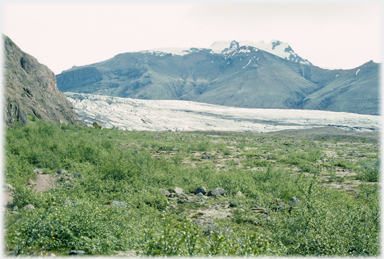 Glacier between hills.