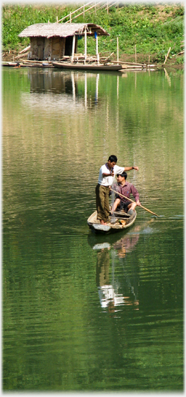Fishermen in small boat.