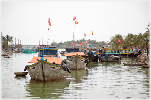 Large craft by Hoi An quay.