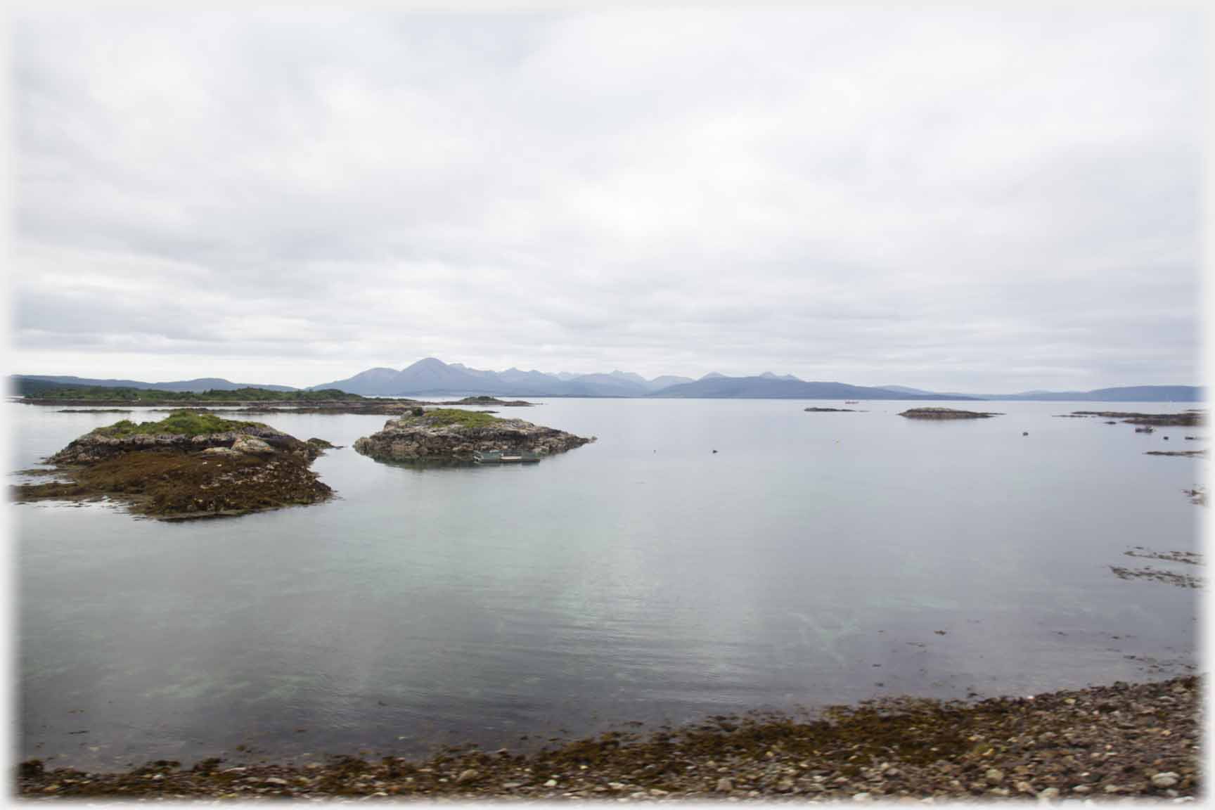 Islets Skye distantly on horizon.