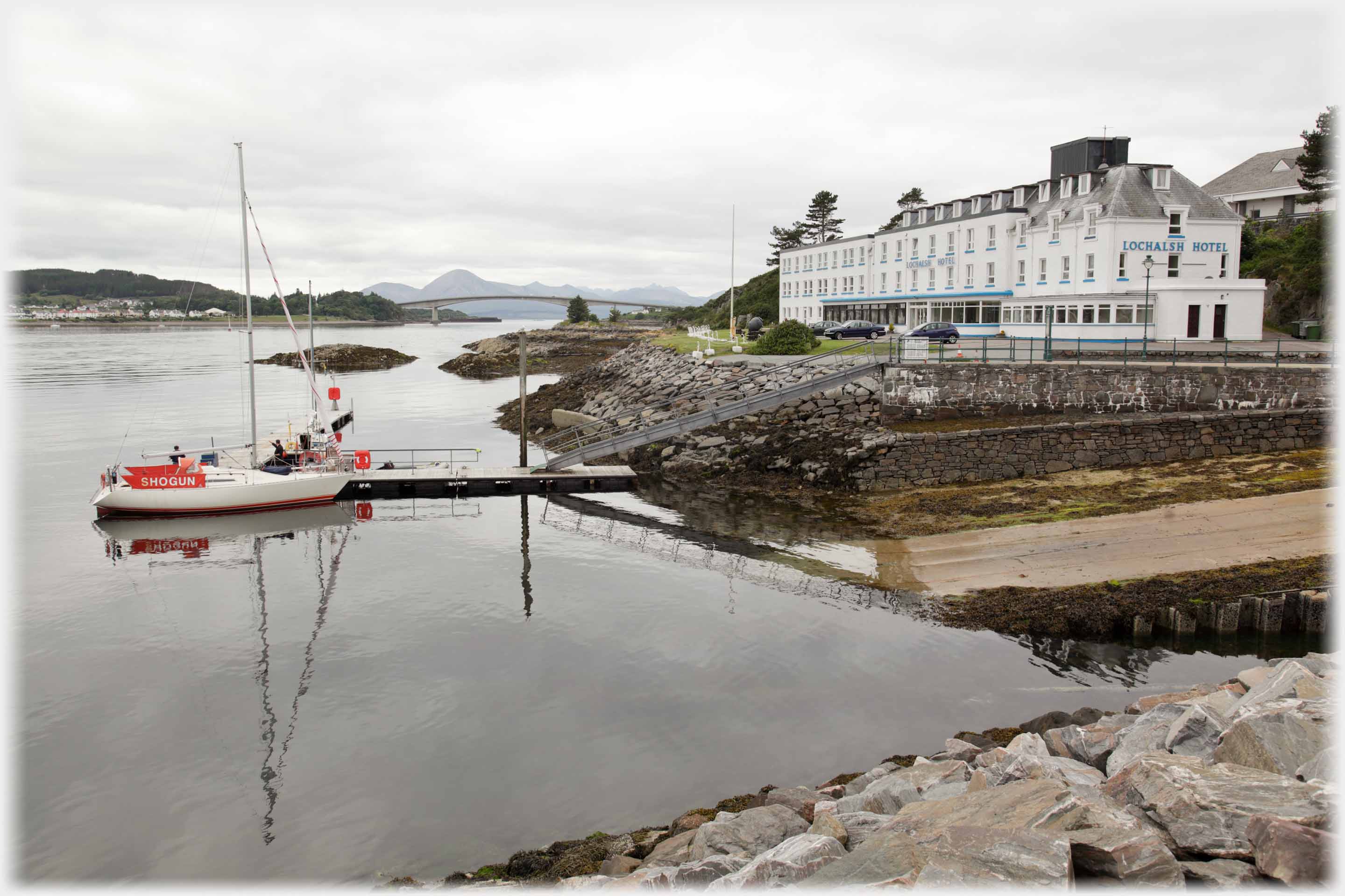 The Lochalsh Hotel, landing stage and bridge in the distance.