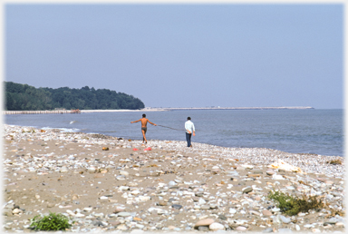 Tourists on Caspian shore.