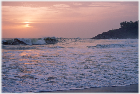 Breakers in the setting sun.