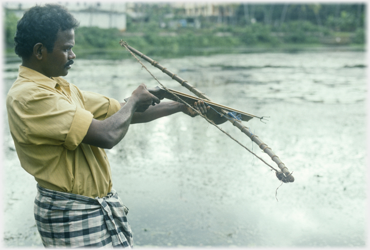 A crossbow firing a harpoon.