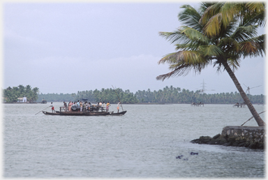 Vehicle ferry being punted.