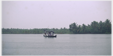 The punted passenger ferry shown in the top picture.