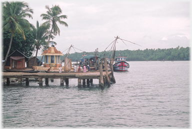 Jetty with nets beyond.