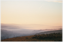 Mist over the valleys near Moffat in firsts light.