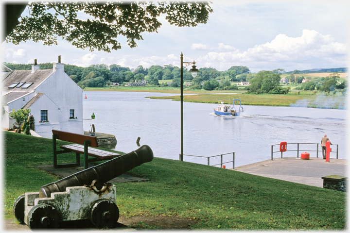 A Fishing boat leaves the harbour.