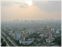 Hazy view across Ha Noi from tower block.