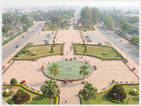 Small park and surrounding Lang Xang Avenue seen from the Patuxai Monument.