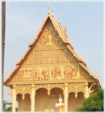 Decorated entrance facade of the Wat That Luang Neua.