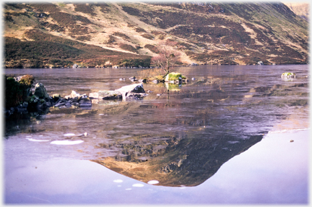 Mid Craig reflected in iced water.