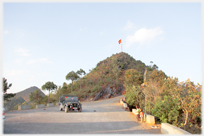 The hill and flag at the northern tip of Vietnam.